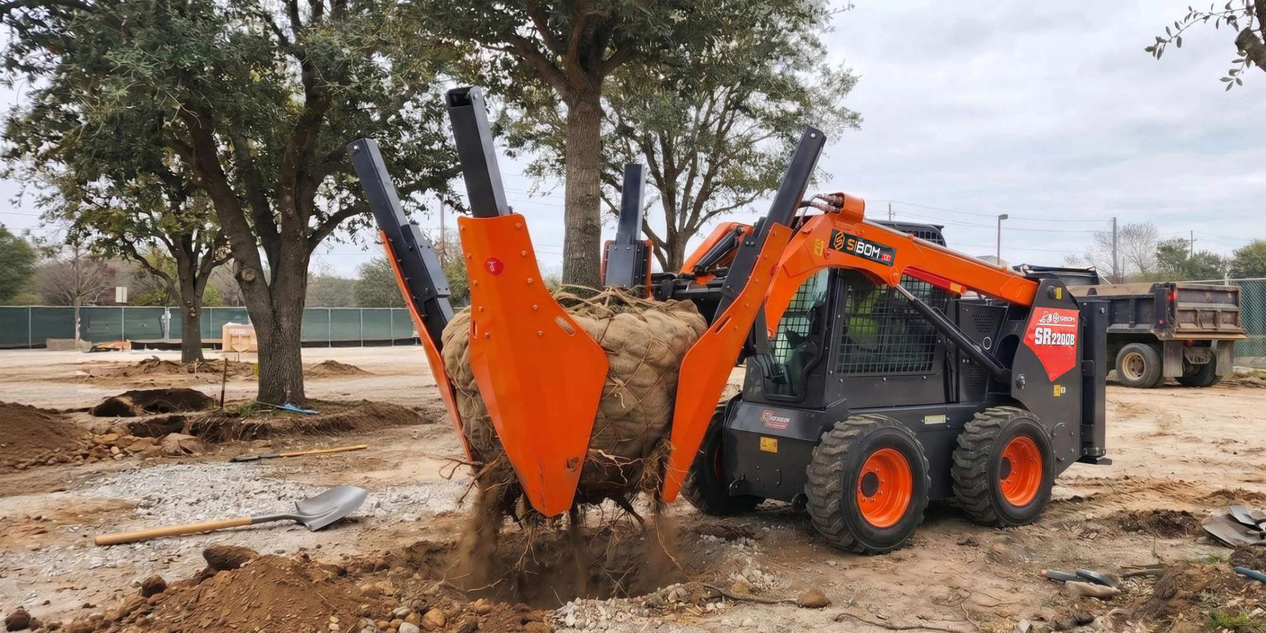 Sibom loader with tree spade for landscaping